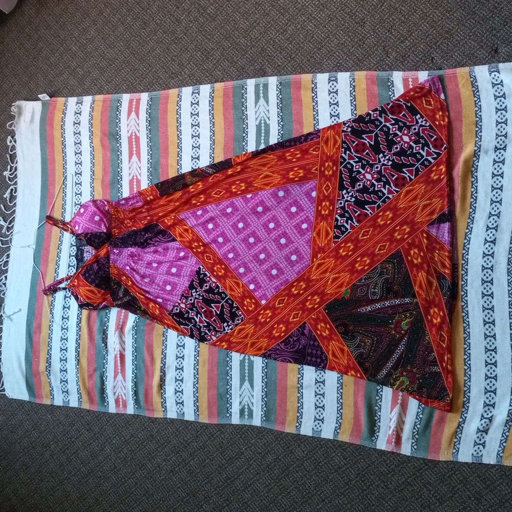 A tribal pattern Summer dress. It's pink, orange, and black. Small